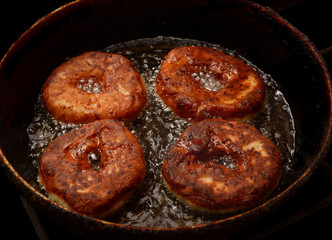 beautiful homemade donuts in a pan