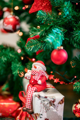 christmas eve and snowman with garlands and lights