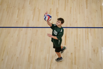 Young volleyball player warming up