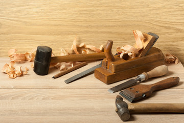 Carpentry concept.Joiner carpenter workplace. Different tools on wooden table. Copy space for text.