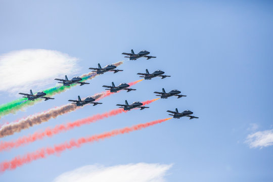 Colorful smoke trails from fleet of planes