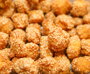onde-onde. indonesian traditional street food. glutinous rice flour and stuffed inside a green bean paste with sesame seeds