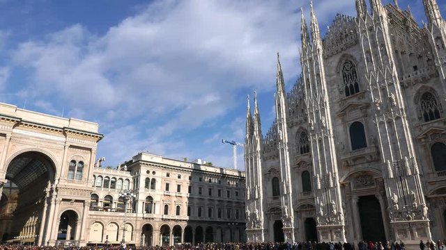 tourists stroll in Piazza Duomo and go shopping for Christmas