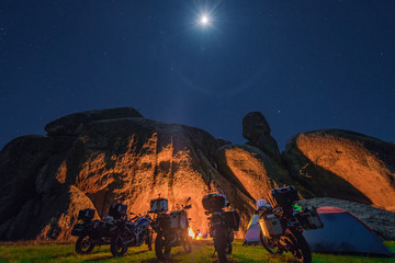 motorcycle camping at a boulder landscape