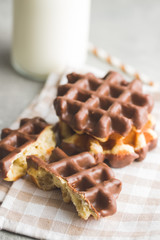 Waffles with chocolate topping.