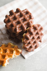 Waffles with chocolate topping.