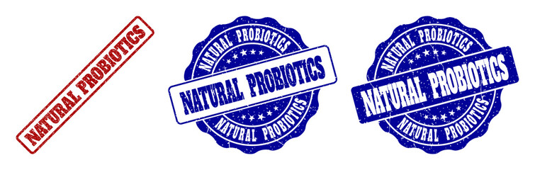 NATURAL PROBIOTICS grunge stamp seals in red and blue colors. Vector NATURAL PROBIOTICS signs with grunge effect. Graphic elements are rounded rectangles, rosettes, circles and text tags.
