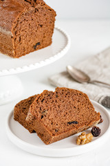Homemade gingerbread cake on white plate. Honey cake.
