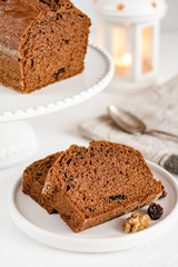 Homemade gingerbread cake on white plate. Honey cake.