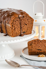 Homemade gingerbread cake on white plate. Honey cake.