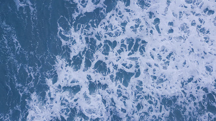 Background waves of the sea with sea foam