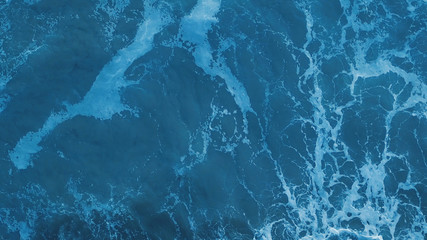 ackground waves of the sea with sea foam