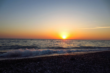 Obraz premium Beautiful view of the sunset at the sea