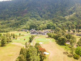 BEDUGUL, BALI / INDONESIA - OCTOBER 27, 2018: Green Bali landscape. Aerial drone top view to Handara golf club. Indonesia.