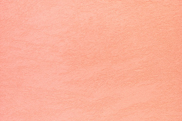 The texture of plastered peach blossom or coral wall, background
