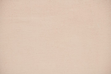 The texture of plastered beige wall, background