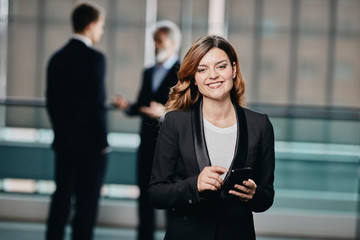 beautiful and successfull business woman in her 30´ in a corporate building