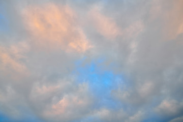 Beautiful sky with clouds in blue and pink colours