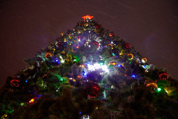 View to the top of decorated Christmas tree