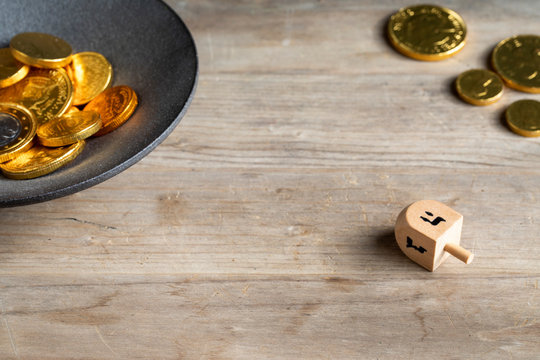 Dreidel game played with chocolate geltwood