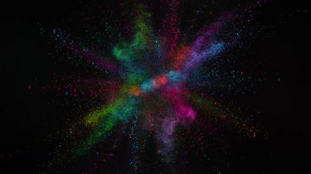 Color powder explosion in super slow motion isolated on black background. Shot with high speed cinema camera at 1000fps
