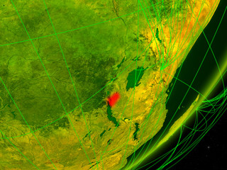 Burundi on green model of planet Earth with network at night. Concept of digital technology, communication and travel.