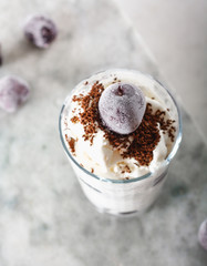 Ice cream with cherry berries on  beautiful marble countertop background