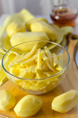 peeled and sliced raw potatoes