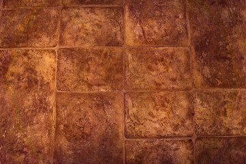 The surface of the floor of stone slabs. Brown blocks texture. Background for the designer.