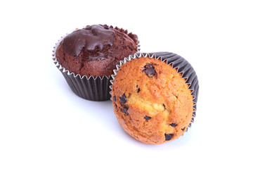 Assorted with Delicious homemade muffin, cupcake with raisins, nuts and chocolate isolated on white background.