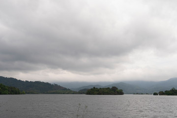 Reservoir environment after rain with mountain at Ang Kep Nam Khuean Khiri Than Bo Weru, Khlung District, Chanthaburi Thailand.