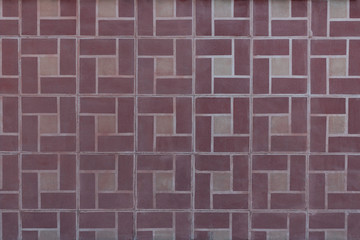 pared de viejos mosaicos de terrazo rosa con blanco