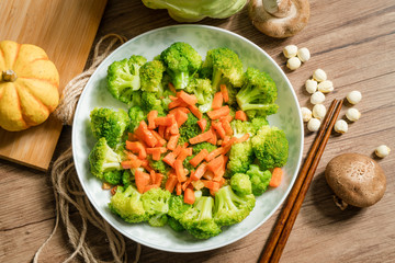 Green broccoli with wooden background