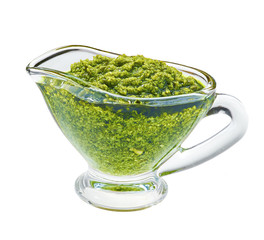 Pesto sauce  in glass bowl on white background