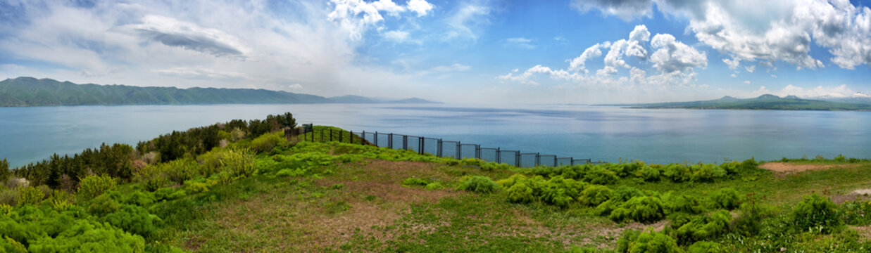 Beautiful view of Sevan lake with turquoise water and green hills, Sevan, Armenia