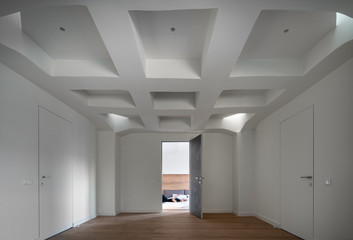 Stylish interior in modern style with design white false ceiling