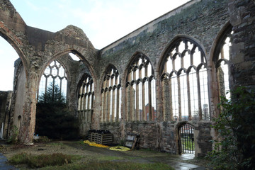 The interior of the abandoned rumbled Saint Peter's Church in the Castle Park, with pointed arch Gothic windows, in Bristol, United Kingdom