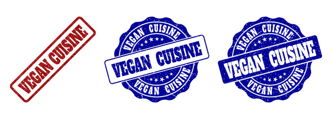 VEGAN CUISINE grunge stamp seals in red and blue colors. Vector VEGAN CUISINE signs with grunge effect. Graphic elements are rounded rectangles, rosettes, circles and text labels.