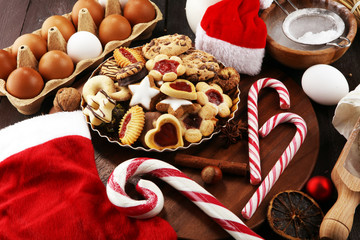 christmas cookies and santa had with spieses, nuts and ingredients. xmas santa shoe