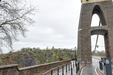 A detail of the tower at the entrance of the Clifton suspension bridge in a cloudy winter day in Bristol, United Kingdom