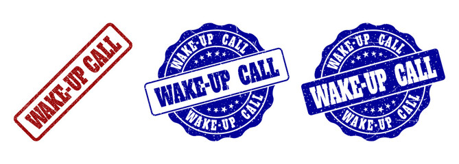 WAKE-UP CALL grunge stamp seals in red and blue colors. Vector WAKE-UP CALL watermarks with grunge effect. Graphic elements are rounded rectangles, rosettes, circles and text labels.