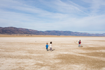 Three Young Kids Lifestyle Portrait Middle Alkali Lake Californi