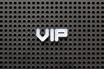 Black color pegboard with white letter in word VIP (abbreviation of very important person)