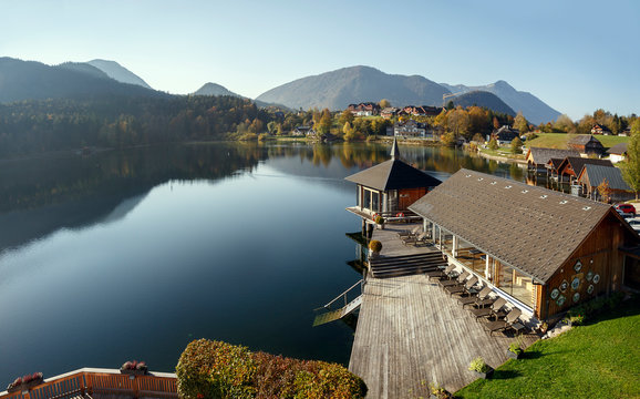 Lake Grundlsee in the fall during the sunrise. View of the Alps. Village Grundlsee, Styria, Austria.
