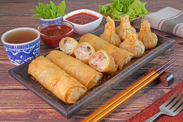 Spring rolls : Crispy deep fried spring rolls and wontons, famous Chinese appetizer.