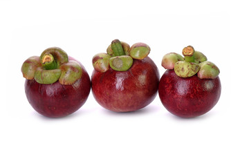 Mangosteen isolated on white background. Mangosteen, the famous exotic delicious tropical fruits from Thailand. Mangosteen also known as Queen of fruits.
