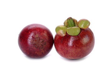 Mangosteen isolated on white background. Mangosteen, the famous exotic delicious tropical fruits from Thailand. Mangosteen also known as Queen of fruits.