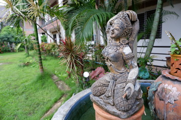 Statue of Mother Earth squeezes hair. Thai people call this Phra mae thorani beeb muay phom or Phra mae thorani twisting her hair. is an chthonic goddess from Buddhist mythology in Southeast Asia.