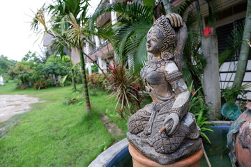 Statue of Mother Earth squeezes hair. Thai people call this Phra mae thorani beeb muay phom or Phra mae thorani twisting her hair. is an chthonic goddess from Buddhist mythology in Southeast Asia.