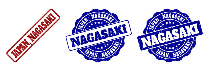JAPAN, NAGASAKI grunge stamp seals in red and blue colors. Vector JAPAN, NAGASAKI labels with grunge texture. Graphic elements are rounded rectangles, rosettes, circles and text titles.